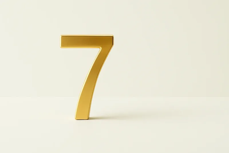 Single large golden seven symbol on cream background with soft shadow